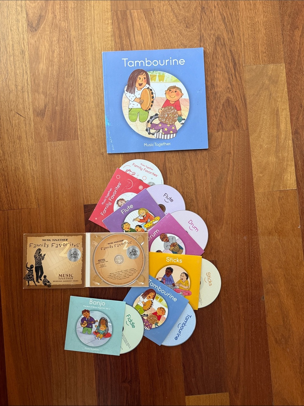 Music Together - CD Set and Tambourine book.